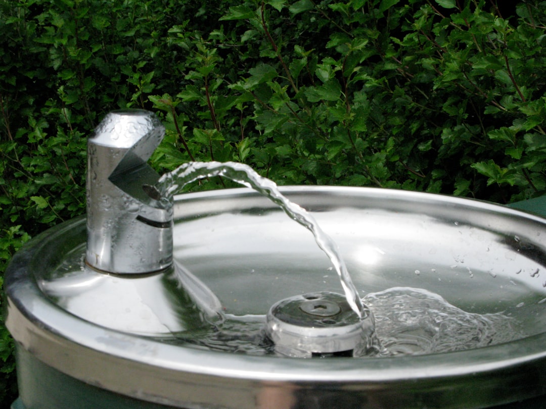 Metal drinking fountain, running water